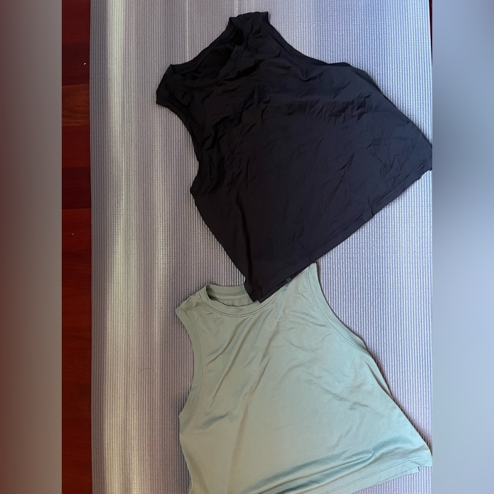 lululemon Athletica - fast and free cropped tanks.
Price is for both. Size 4/6.